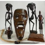 A collection of African carved wood Tribal figures: Comprising wall mask, large figures, knife,