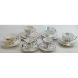 A collection of Shelley Trios & cups and saucer sets to include: Stylized Flowers 12559,