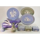 A collection of Wedgwood Jasperware to include: Boxed plates, two oval plaques, lidded boxes,