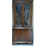 20th century Astragal glazed Mahogany Bookcase: With 2 door base.