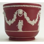 A Wedgwood Crimson dipped Jasperware Jardiniere: Decorated with Neo Classical scenes Apollo and