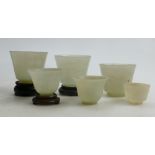 A collection of six Jade Beakers in varying sizes: Three of which have hardwood stands,