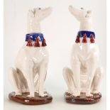 Pair of mid 20th century Majolica pottery large seated Dogs: Height 36cm.