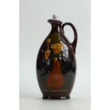 Royal Doulton Dewars Kingsware jug The Connoisseur: With later stopper, height 24.5cm.