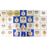 A collection of Geobel decorative wall plates etc.