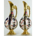 Royal Crown Derby pair of Ewers in the Imari design: Height 26cm.