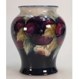 An early Moorcroft Pansy Vase: Height 17.5cm.