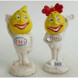 A pair of cast metal Esso advertising fi