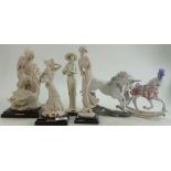 A collection of ceramic figures: Three f