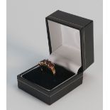 9ct gold ladies ring set with 5 garnets: size O, 3.5 grams.