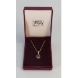 9ct gold necklace and pendant set with pink stone and diamonds, 3.2 grams.