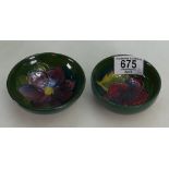 Moorcroft Hibiscus and Pansy dishes: diameter of largest 9cm(2)
