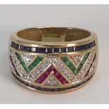 9ct gold dress ring: size O set with multicoloured semi precious stones, 5.5 grams.