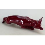 A Royal Doulton large Stalking Fox in Flambe glaze 32cm long.