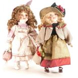 Two Large Porcelain Display Dolls: