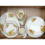 A collection of Floral Decorated Crown Ducal Dinner Ware: