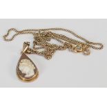 9ct gold necklace with oval cameo pendant: 4.9 grams.