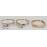 Three 14ct gold rings set white stones / CZ's: Weight 7.