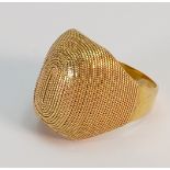 Gold coloured metal ring of high carat: Modern Eastern type ring, tests for around 18ct gold,