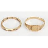 two 9ct gold rings: 2.8 grams.