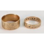 9ct gold wedding ring and 9ct gold eternity ring: 7.1 grams.