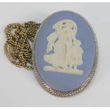 Wedgwood oval medallion brooch with silver mounts: