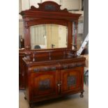 Edwardian Mirror backed Walnut Sideboard: with carved panel decoration