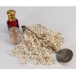 Three string natural freshwater pearls with 14ct gold decorative catch, scent bottle etc.