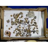 A collection of metal/brass buttons: together with a cased mounted medal, brooches etc (1 tray)