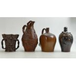 A collection of Stoneware Jugs: Height of tallest 28cm. (4)