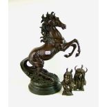 A large bronze effect resin rearing horse figure 66cm tall: plus 2 bronze effect resin North