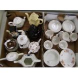 A collection of novelty tea and coffee pots: a Crown Derby plate, cups and saucers etc (2 trays).