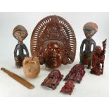 A collection of Asian & Oceanic carved wood items: Including carved figures, primitive figures, wall