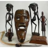 A collection of African carved wood Tribal figures: Comprising wall mask, large figures, knife,