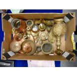 A mixed collection of Brassware items to include: lidded pots, ornaments, bells etc