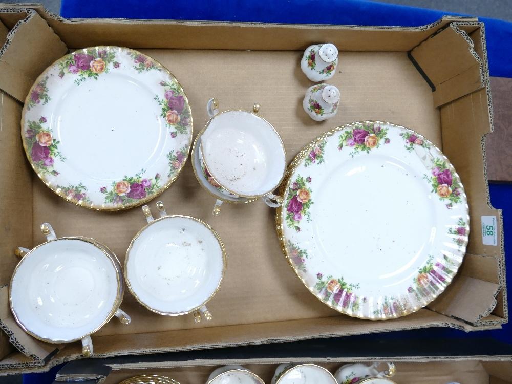 A collection of Royal Albert Old Country Rose items to include: dinner plates, handled cups, side