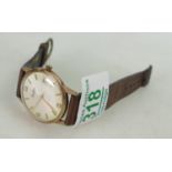 A gents 9ct gold Bentima Star Quartz watch: with the inscription Doulton Mr H Cartlidge loyal