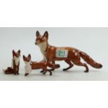 Beswick large standing fox: together with a small seated fox model 1748 and a small standing fox