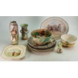 A collection of Royal Doulton Seriesware: Including various rack plates, bowls, vases, Titanian bird