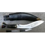Nepalese Kukri knife in leather sheath:dated 1997 length 41cm.