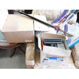 A mixed collection of items to include boxed games: tennis and squash rackets,