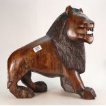 A large African Hardwood figure of a Lion: bought back from holidays in the 1970's,
