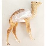 Beswick model of a camel foal 1043: (Leg broke)