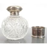 Silver topped large scent flask / bottle: Cut glass bottle with hallmarked silver top,