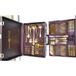 A cased Bestecke SBS Solingen canteen of cutlery: in 23/24ct gold plate