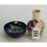 Moorcroft Orchid on Green Ground small vase (hairline to body)and similar small dish: height of