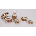 A collection of Royal Crown Derby items to include: Phoenix patterned graduated boxes,