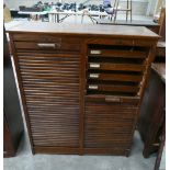 1920's Oak Double Roller Shutter Filing Cabinet: with fitted drawers, height 107cm,
