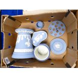 A collection of Wedgwood Blue jasperware to include: large flower vase, lidded box,