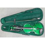 Modern green Violin in case with bow: Blue Moon label inside, length at back 37cm, overall 59.5cm.